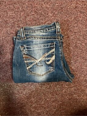 Cruel Classic Mid-Blue Skinny Jeans with Embroidered Back Pocket